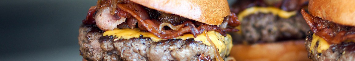 Eating American (Traditional) Burger Hot Dog at The Root Beer Shack restaurant in Parkersburg, WV.